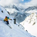 Skiing in the snowy mountains, good winter day.