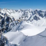 Mont-Blanc Mountain Range, Chamonix, Hautes-Savoie, Alps, France: Winter View from Aiguille du Midi near the Vallee Blanche ski resort, Les Grandes Jorasses (right) and Chamonix Needle (left)