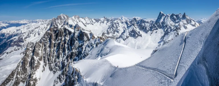 Mont-Blanc Mountain Range, Chamonix, Hautes-Savoie, Alps, France: Winter View from Aiguille du Midi near the Vallee Blanche ski resort, Les Grandes Jorasses (right) and Chamonix Needle (left)