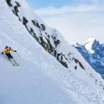Skiing in the snowy mountains, good winter day.