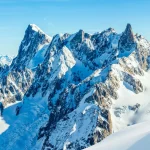 Skiing Vallee Blanche Chamonix with amazing panorama of Grandes Jorasses and Dent du Geant from Aiguille du Midi, Mont Blanc mountain, Haute-Savoie, France