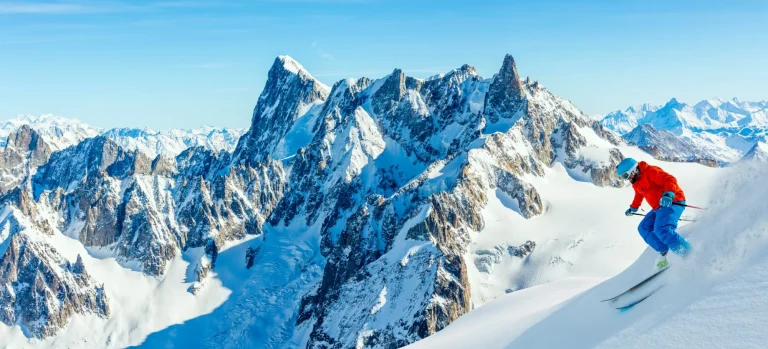 Skiing Vallee Blanche Chamonix with amazing panorama of Grandes Jorasses and Dent du Geant from Aiguille du Midi, Mont Blanc mountain, Haute-Savoie, France